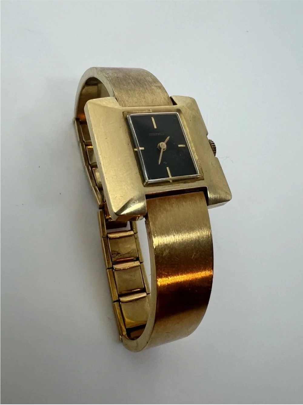 Seiko mechanical Gold-Tone Women's Bracelet Watch with Black Dial
